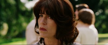 Movie still from “American Wedding” (2003), directed by Jesse Dylan – A person wearing a jacket; Close Up shot, Over the shoulder angle