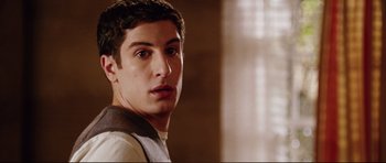 Movie still from “American Wedding” (2003), directed by Jesse Dylan – A man that is staring at the camera; Close Up shot, Over the shoulder angle