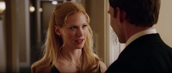 Movie still from “American Wedding” (2003), directed by Jesse Dylan – A beautiful young woman with long blonde hair and blue eyes; Close Up shot, Over the shoulder angle