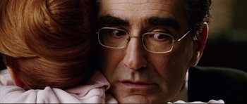Movie still from “American Wedding” (2003), directed by Jesse Dylan – A person wearing glasses; Close Up shot, Overhead angle