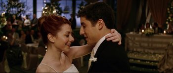 Movie still from “American Wedding” (2003), directed by Jesse Dylan – A man and a woman dancing together at a wedding; Close Up shot, Low angle