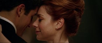 Movie still from “American Wedding” (2003), directed by Jesse Dylan – A woman's face with a man's ear; Close Up shot, Overhead angle