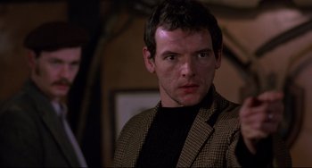 Movie still from “An American Werewolf in London” (1981), directed by John Landis – A person wearing a jacket; Close Up shot, Over the shoulder angle