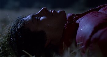 Movie still from “An American Werewolf in London” (1981), directed by John Landis – A man laying on the ground with his eyes closed; Close Up shot, Low angle