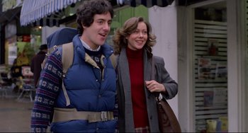 Movie still from “An American Werewolf in London” (1981), directed by John Landis – A man and a woman walking down a street; Medium shot, Low angle