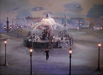 Movie still from “An American in Paris” (1951), directed by Vincente Minnelli – A man is running in front of a water fountain; Extreme Wide shot, High angle