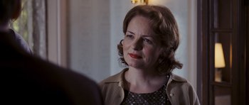 Movie still from “An Education” (2009), directed by Lone Scherfig – A person wearing a jacket; Close Up shot, Over the shoulder angle