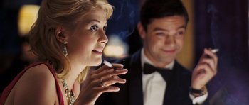 Movie still from “An Education” (2009), directed by Lone Scherfig – A man and a woman are smoking a cigarette; Close Up shot, Over the shoulder angle