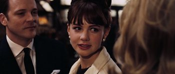 Movie still from “An Education” (2009), directed by Lone Scherfig – A person wearing a jacket; Close Up shot, Over the shoulder angle