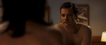 Movie still from “An Education” (2009), directed by Lone Scherfig – A person in a mirror; Close Up shot, Over the shoulder angle