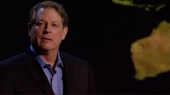 Movie still from “An Inconvenient Truth” (2006), directed by Davis Guggenheim – A person wearing a suit and tie; Close Up shot, Low angle