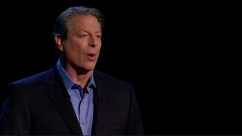 Movie still from “An Inconvenient Truth” (2006), directed by Davis Guggenheim – A man wearing a suit and a blue shirt is speaking; Close Up shot, Low angle