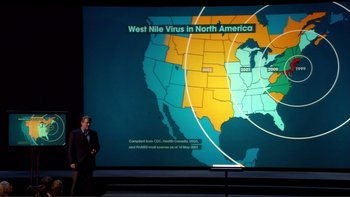 Movie still from “An Inconvenient Truth” (2006), directed by Davis Guggenheim – A man standing in front of a large map of the united states; Medium shot, High angle