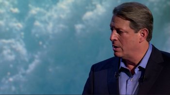 Movie still from “An Inconvenient Truth” (2006), directed by Davis Guggenheim – A person wearing a suit and tie; Close Up shot, Low angle