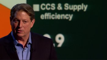 Movie still from “An Inconvenient Truth” (2006), directed by Davis Guggenheim – A person in front of a sign; Close Up shot, Over the shoulder angle