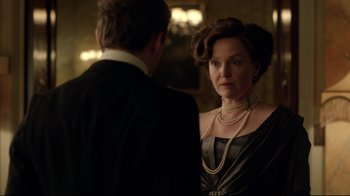 Movie still from “An Inspector Calls” (2015), directed by Raymond Pak-Ming Wong – A man and a woman in formal wear looking at each other; Close Up shot, Over the shoulder angle