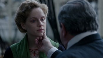 Movie still from “An Inspector Calls” (2015), directed by Raymond Pak-Ming Wong – A man touching the chin of a young woman; Close Up shot, Over the shoulder angle