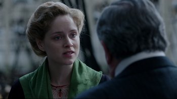 Movie still from “An Inspector Calls” (2015), directed by Raymond Pak-Ming Wong – A young woman wearing a green scarf talking to an older man; Close Up shot, Over the shoulder angle