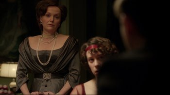 Movie still from “An Inspector Calls” (2015), directed by Raymond Pak-Ming Wong – A woman and a child in a room; Medium shot, Over the shoulder angle