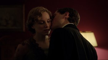 Movie still from “An Inspector Calls” (2015), directed by Raymond Pak-Ming Wong – A man and a woman kissing in a dark room; Close Up shot, Low angle