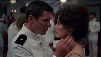 Movie still from “An Officer and a Gentleman” (1982), directed by Taylor Hackford – A man and a woman in military dress uniforms; Close Up shot, Low angle