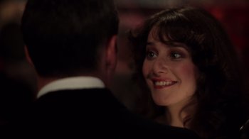 Movie still from “An Officer and a Gentleman” (1982), directed by Taylor Hackford – A man and a woman smiling at each other; Close Up shot, Over the shoulder angle