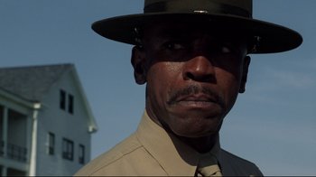 Movie still from “An Officer and a Gentleman” (1982), directed by Taylor Hackford – A person wearing a uniform; Close Up shot, Low angle