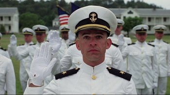 Movie still from “An Officer and a Gentleman” (1982), directed by Taylor Hackford – A group of men in white suits and white hats; Medium shot, Low angle