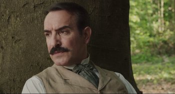 Movie still from “An Officer and a Spy” (2019), directed by Roman Polanski – A person wearing a vest and tie; Close Up shot, Low angle