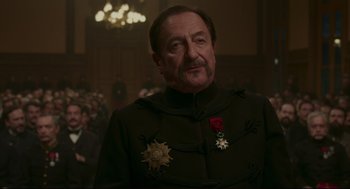 Movie still from “An Officer and a Spy” (2019), directed by Roman Polanski – A person wearing a uniform; Close Up shot, Low angle