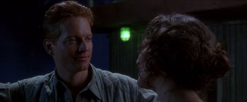 Movie still from “Anaconda” (1997), directed by Luis Llosa – A man and a woman talking to each other; Close Up shot, Over the shoulder angle