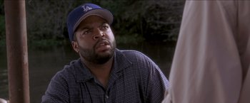 Movie still from “Anaconda” (1997), directed by Luis Llosa – A person wearing a hat; Close Up shot, Over the shoulder angle