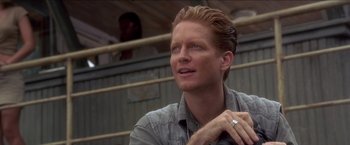 Movie still from “Anaconda” (1997), directed by Luis Llosa – A person with a ring on his finger; Close Up shot, Low angle