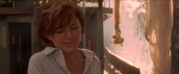 Movie still from “Anaconda” (1997), directed by Luis Llosa – A person with her eyes closed; Close Up shot, Over the shoulder angle