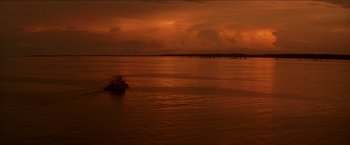 Movie still from “Anaconda” (1997), directed by Luis Llosa – A large body of water near a body of water; Extreme Wide shot, High angle