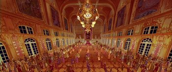 Movie still from “Anastasia” (1997), directed by Gary Goldman – A group of people standing in a large room; Extreme Wide shot, High angle