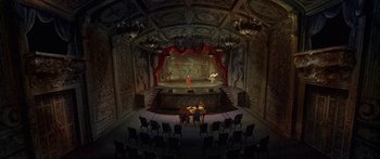 Movie still from “Anastasia” (1997), directed by Gary Goldman – A stage with a lot of people sitting in it; Extreme Wide shot, High angle