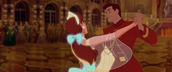 Movie still from “Anastasia” (1997), directed by Gary Goldman – A man and a woman dancing in front of a building; Medium shot, Low angle