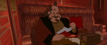 Movie still from “Anastasia” (1997), directed by Gary Goldman – A man with a beard is holding a piece of paper in his hands; Medium shot, High angle