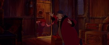 Movie still from “Anastasia” (1997), directed by Gary Goldman – A man in a red coat and a red hat is in front of another man; Medium shot, High angle