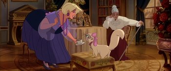 Movie still from “Anastasia” (1997), directed by Gary Goldman – A woman holding a coffee cup in front of a white cat; Wide shot, Over the shoulder angle