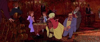 Movie still from “Anastasia” (1997), directed by Gary Goldman – A group of people sitting around a table; Wide shot, High angle