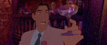 Movie still from “Anastasia” (1997), directed by Gary Goldman – A man holding a wine goblet in front of another man; Medium shot, Over the shoulder angle