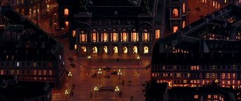 Movie still from “Anastasia” (1997), directed by Gary Goldman – An aerial view of a city street at night; Extreme Wide shot, High angle