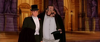 Movie still from “Anastasia” (1997), directed by Gary Goldman – A man in a top hat standing next to another man in a tuxedo; Medium shot, Over the shoulder angle