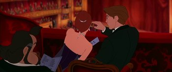 Movie still from “Anastasia” (1997), directed by Gary Goldman – A man and a woman sitting in a theater; Medium shot, High angle