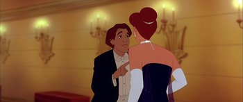 Movie still from “Anastasia” (1997), directed by Gary Goldman – A man and a woman in formal wear talking to each other; Medium shot, Over the shoulder angle