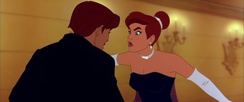 Movie still from “Anastasia” (1997), directed by Gary Goldman – A woman in a black dress and a man in a black suit; Close Up shot, Over the shoulder angle