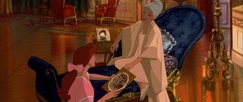 Movie still from “Anastasia” (1997), directed by Gary Goldman – An old woman is holding a tray while a young girl is holding a plate; Medium shot, High angle