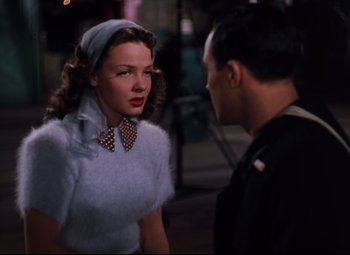 Movie still from “Anchors Aweigh” (1945), directed by Joseph Barbera – A man and a woman talking to each other; Close Up shot, Over the shoulder angle